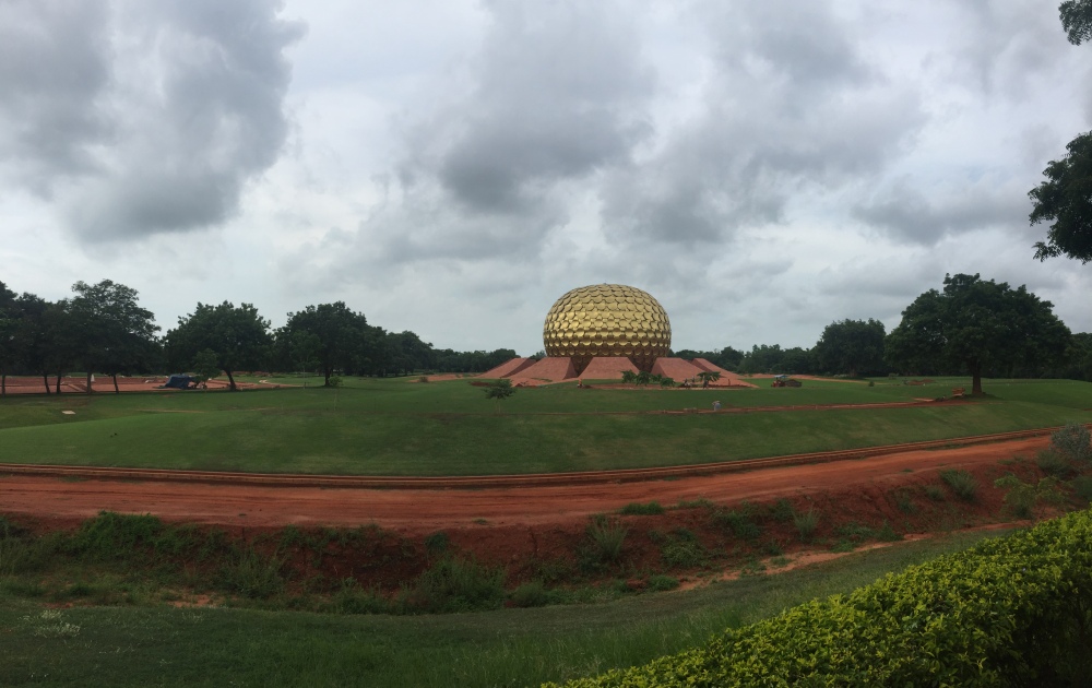 This is a picture of the Matrimandir in the center of Auroville. It is a large golden globe that the people living inside the town worship in. They follow the preachings of The Mother.